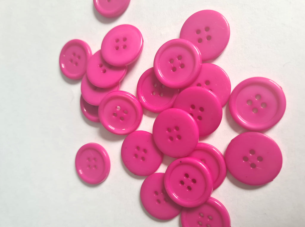 pink round buttons uk